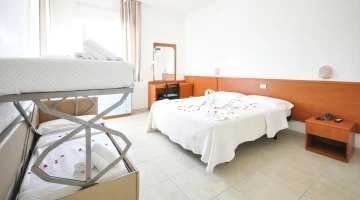 Chambre quadruple avec lits superposés