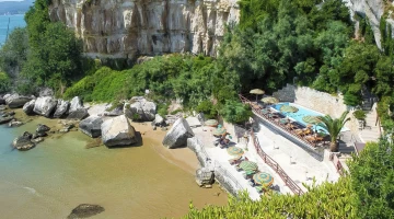 View of the private beach and swimming pool