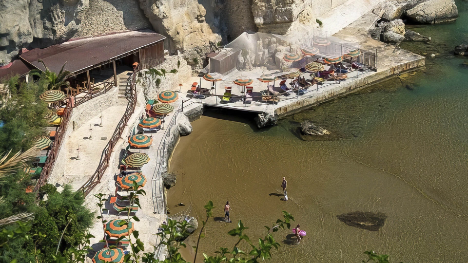 External facade of the hotel with private beach