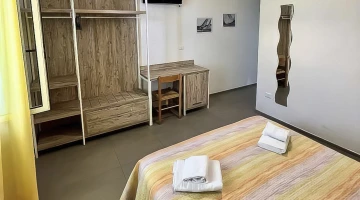    Open wardrobe and TV in the room