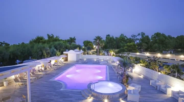 Swimming pool illuminated in the evening