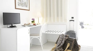 Superior room with TV and desk