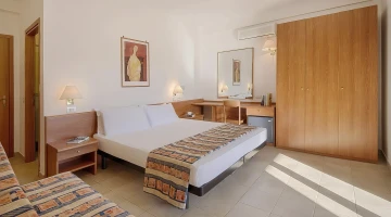 Room with double bed and single bed