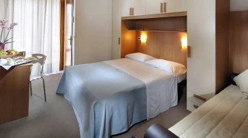 Chambre triple classique avec balcon