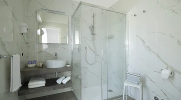 Renovated bathroom with shower cubicle