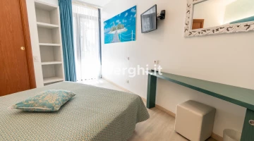 Single room with TV and balcony