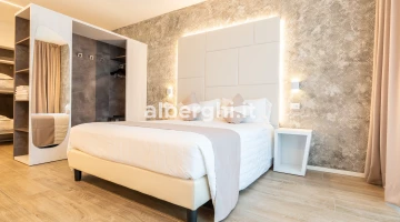 Master bedroom with parquet flooring