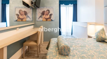 Desk and balcony in double room