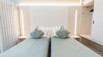 Room with two separate beds