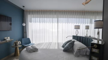 Letto rotondo in Junior Suite fronte mare