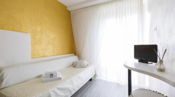 Camera tripla Exclusive con divano letto