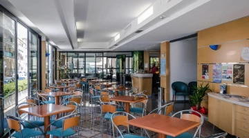 Common area with bar and tables