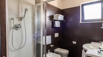 Bathroom with shower box in Superior room