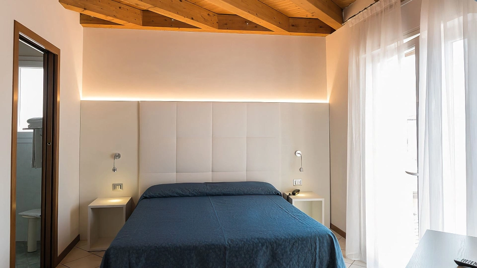 Double bedroom with exposed beams