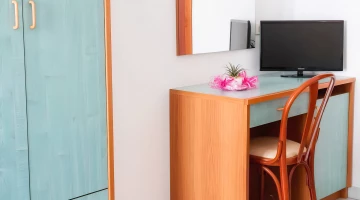 Desk with TV in the room