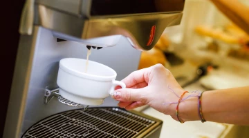Machines for preparing hot drinks