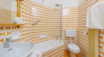Private bathroom with bathtub