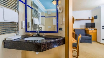 Bathroom with towel set and hairdryer