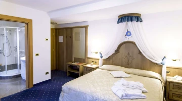 Room with bathroom and bathrobes
