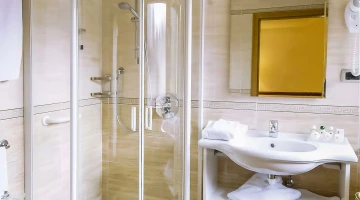 One bedroom bathroom with shower box