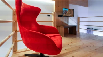 Soppalco con poltrona in Junior Suite