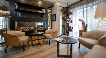 Area comune con caminetto elettrico
