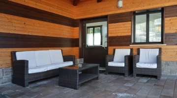 Outdoor area furnished with sitting area