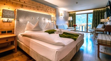 Junior suite con balcone arredato