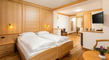 Junior suite with wooden furnishings