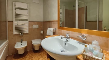 Bathroom with bathtub and complimentary toiletries