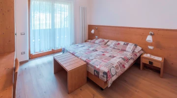 Camera familiare con angolo cottura