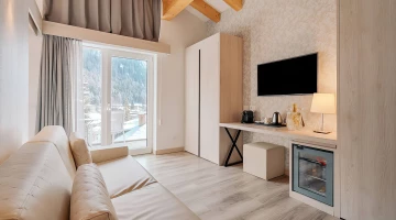 Chambre avec canapé-lit