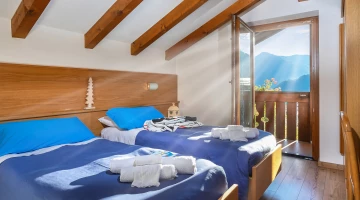 Doppelzimmer mit freiliegenden Balken