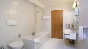 Private bathroom with shower tub