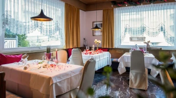 Tables set in the restaurant hall