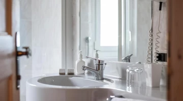 Bathroom of a room with hairdryer
