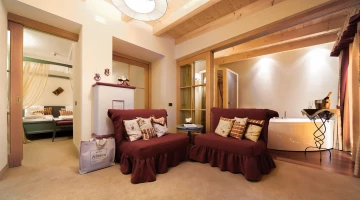 Suite avec coin salon et baignoire