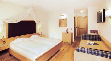 Chambre double avec coin salon
