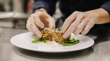 Preparing a dish at the restaurant