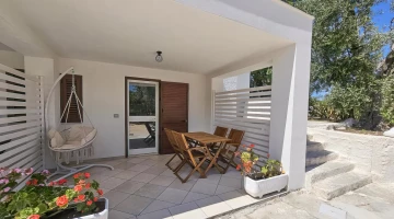Patio furnished with tables and chairs