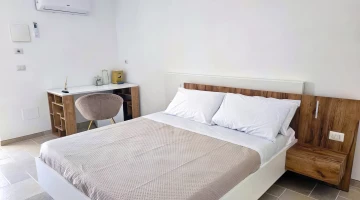 Room with desk and air conditioning