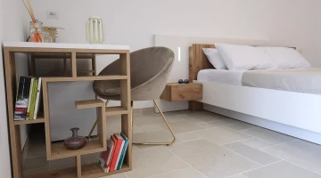 Detail of the bookcase in the bedroom