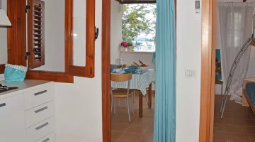 Apartment with kitchen and covered terrace