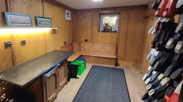 Ski storage with boot warmer