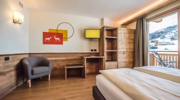 Room with TV and desk