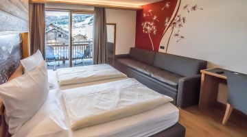 Double room with sofa and balcony