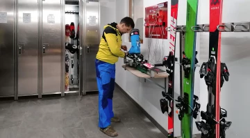 Ski storage with maintenance area