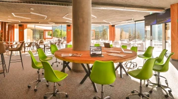 Common area with tables and chairs
