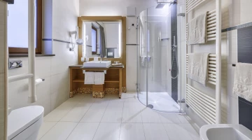 One bedroom bathroom with shower box