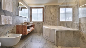 Private bathroom with bathtub